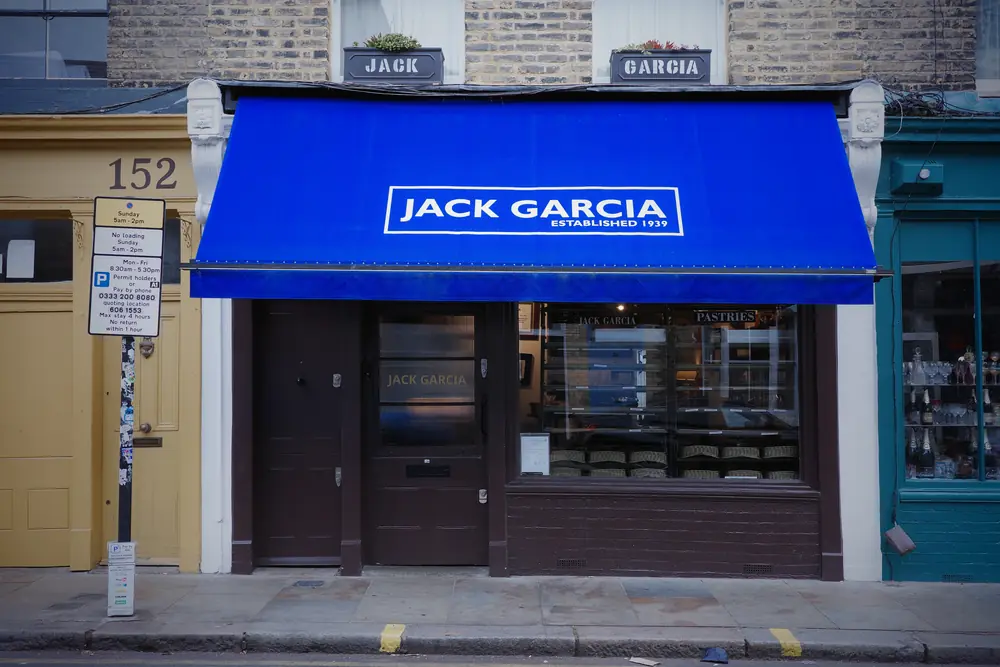 Jack Garcia shopfront on Columbia Road with its blue awning
