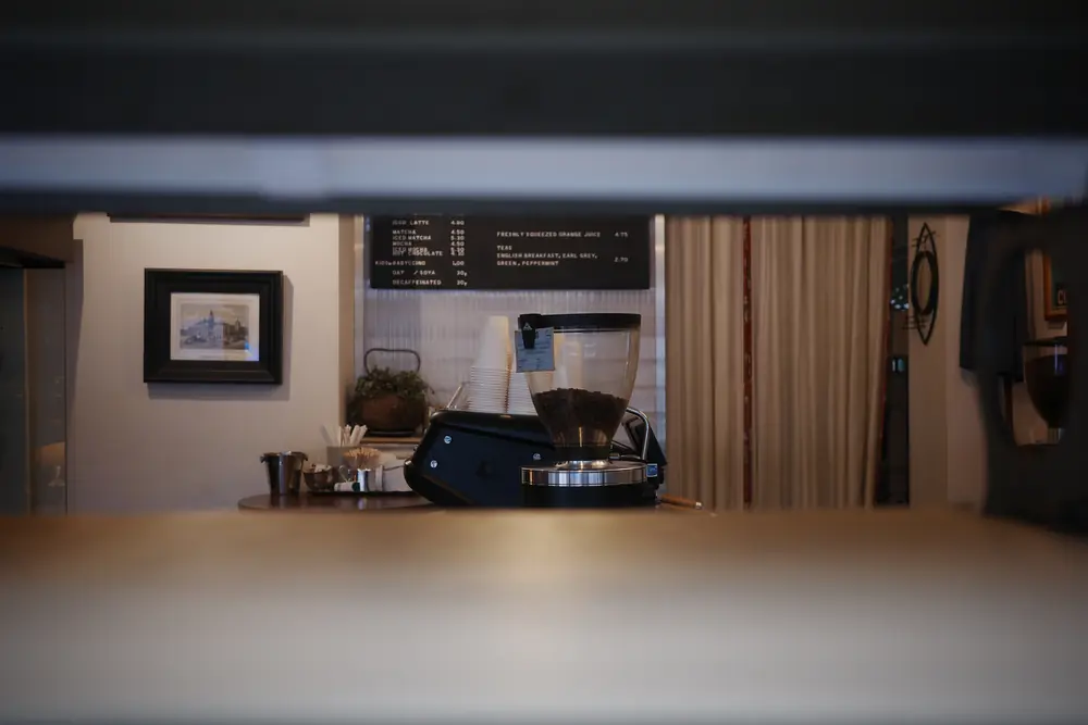 Low view across the counter to the menu board