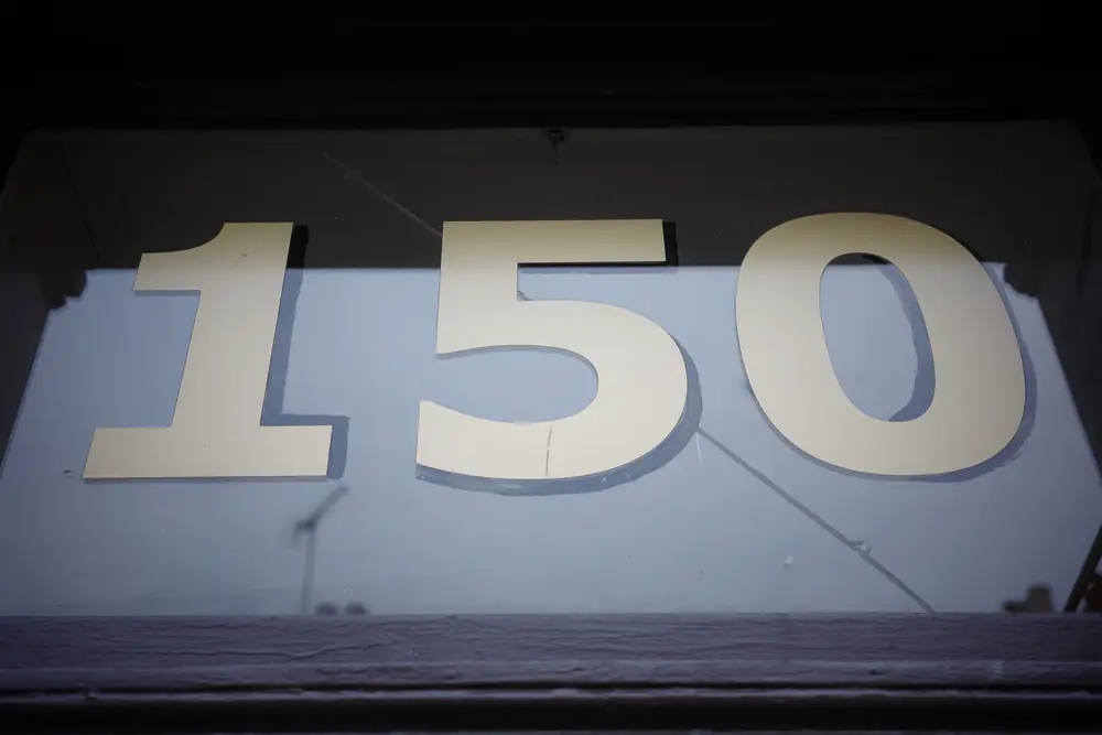 The 150 house number above the door